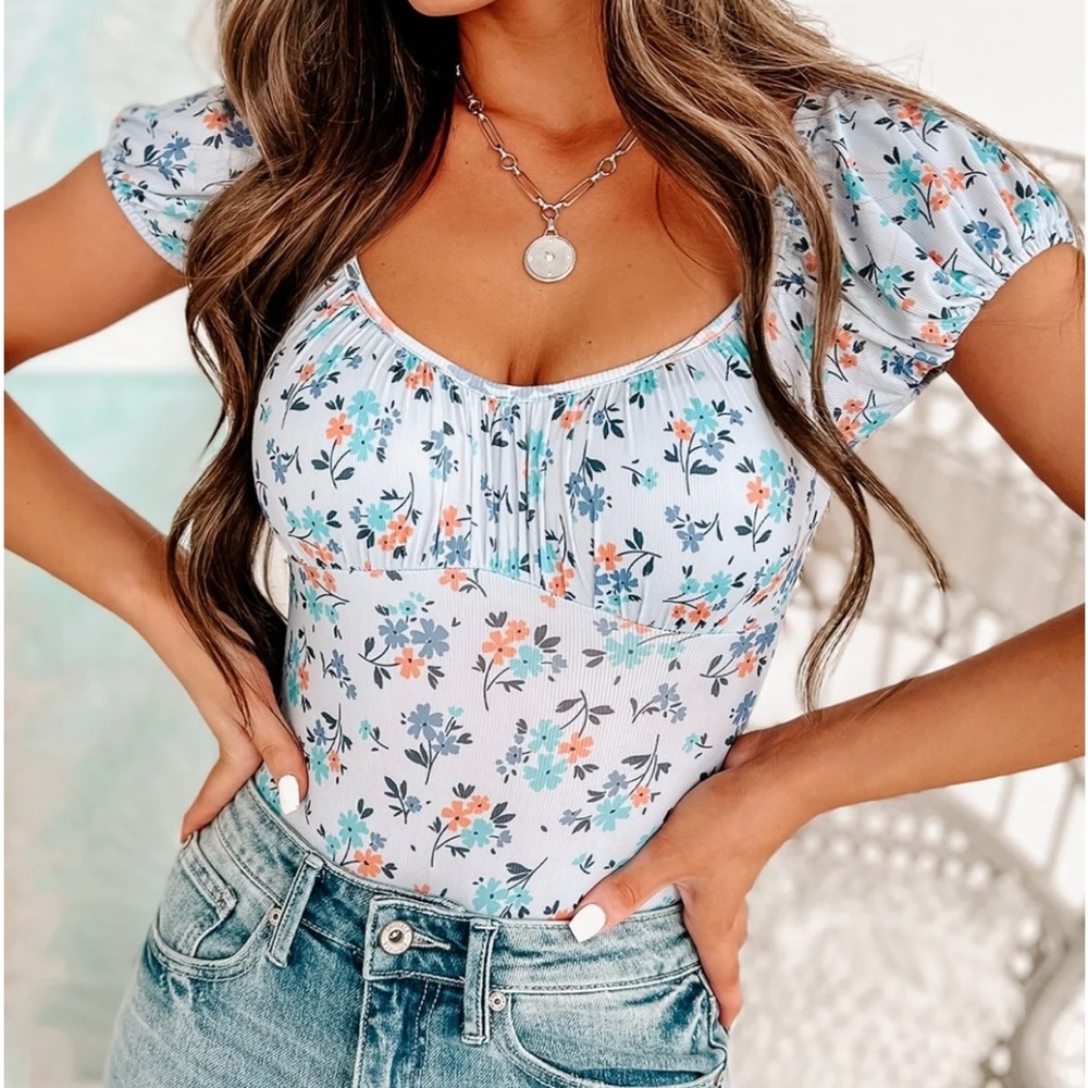NanaMacs, size small, blue floral bodysuit